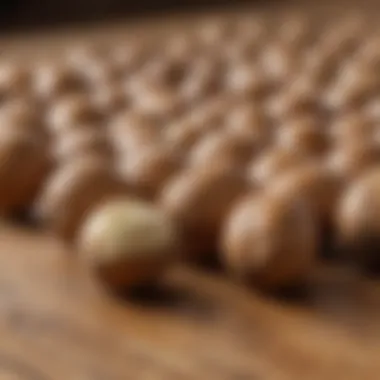 A close-up of macadamia nuts on a wooden surface