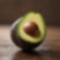 Avocado pit ready for sprouting with water and toothpicks